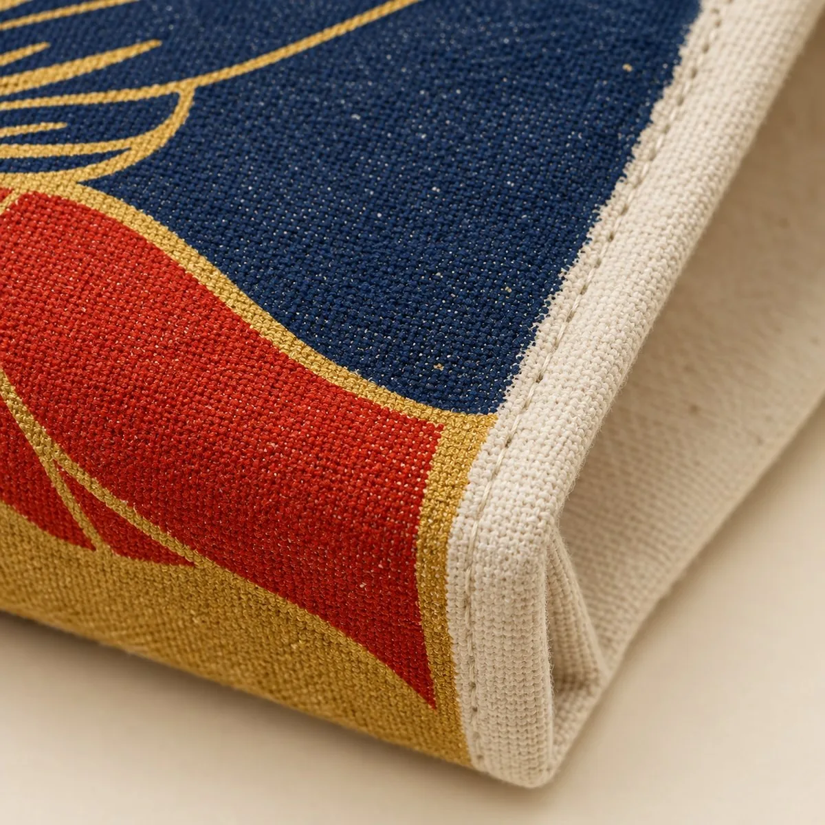 Print edge — ink sitting in the canvas weave
